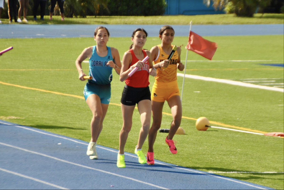 Looking to get seperation from her opponents, sophomore Avril Donner runs the first leg of the 4 by 800 meter relay, leading the girls team to a tenth place finish in the event.