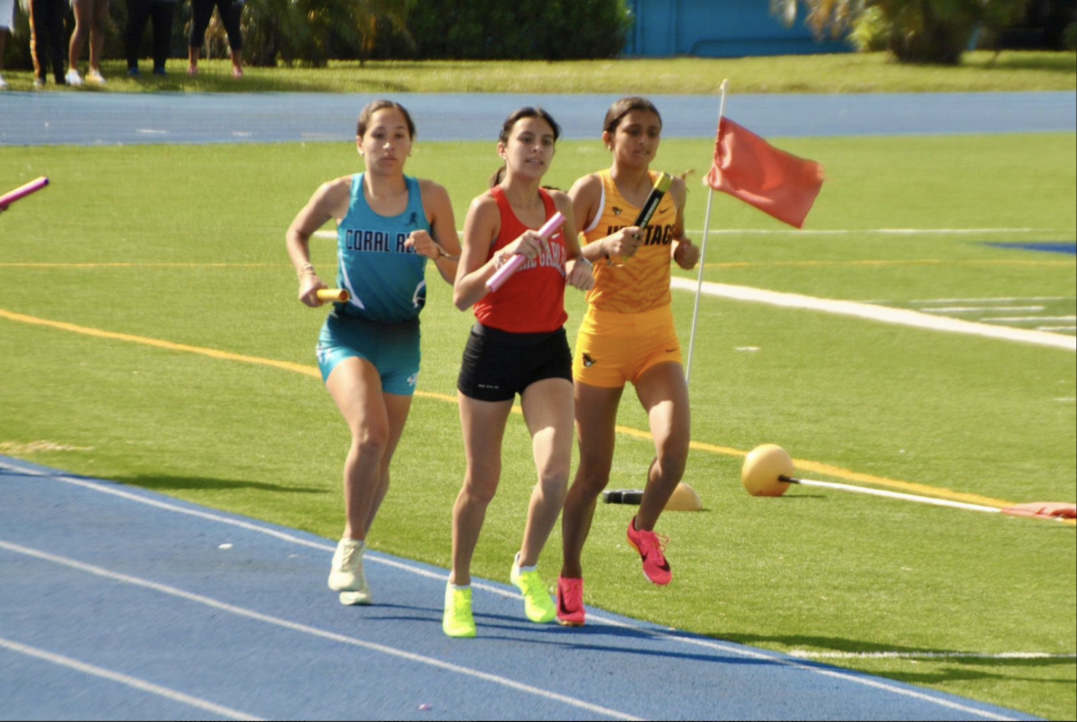 Looking+to+get+seperation+from+her+opponents%2C+sophomore+Avril+Donner+runs+the+first+leg+of+the+4+by+800+meter+relay%2C+leading+the+girls+team+to+a+tenth+place+finish+in+the+event.