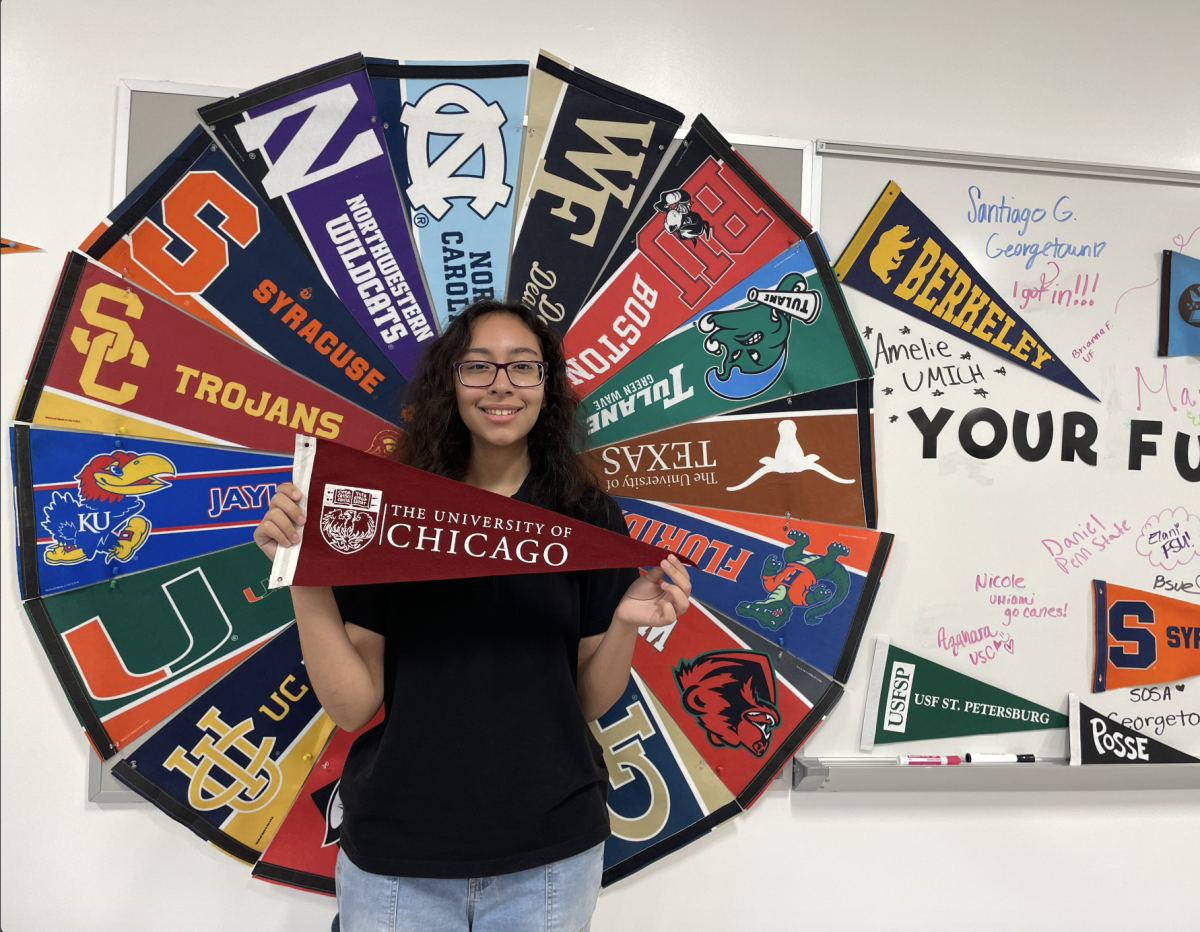 Maria+Rivero+stands+proudly+showing+her+new+school+the+University+of+Chicago.