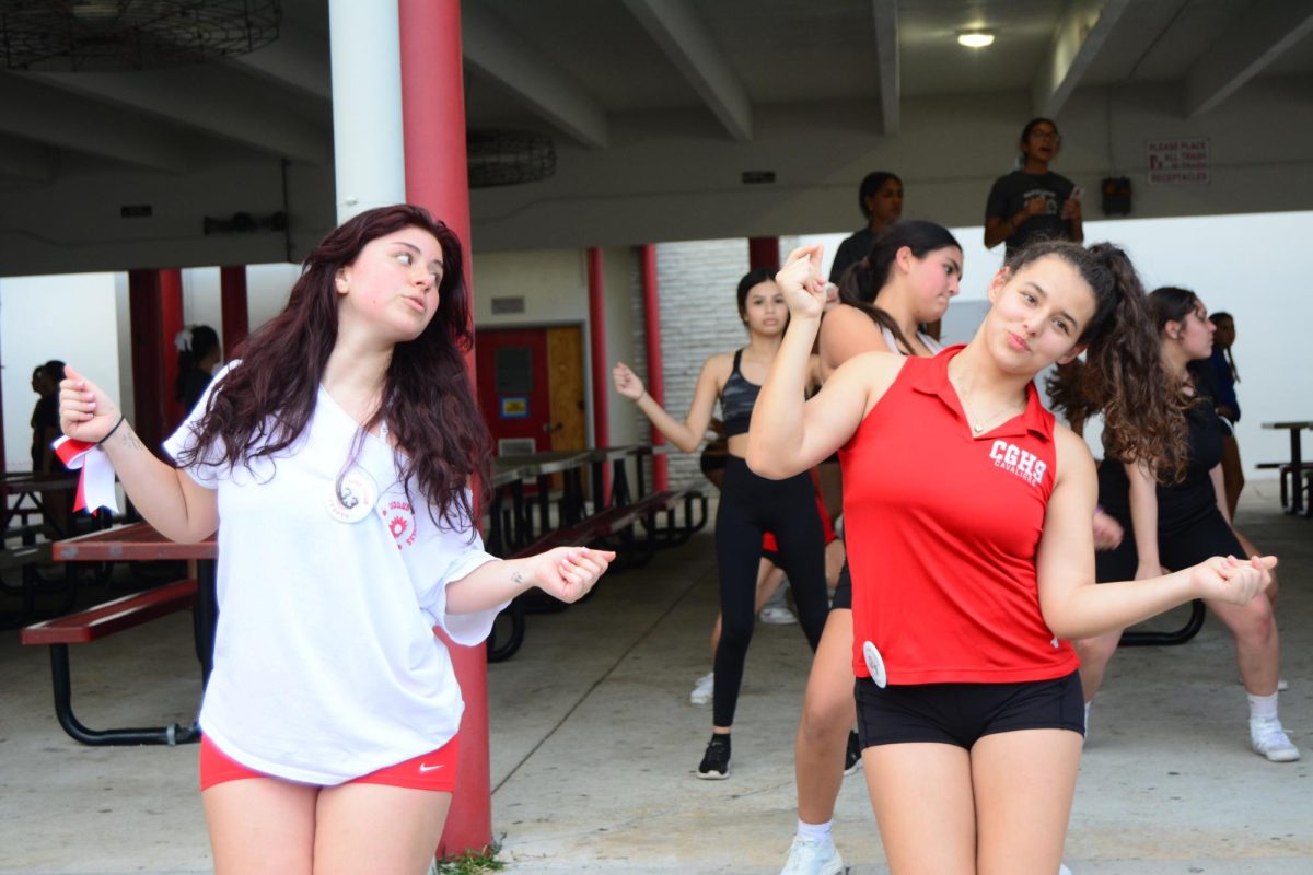 During Gables' 2024-2025 cheer tryouts, seasoned cheerleaders helped teach the dance choreography to newcomers.