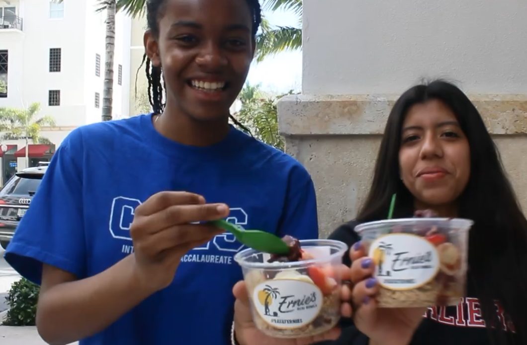 Following the trend of #eataternies, both seniors enjoy a spoonful of “The Automatic” açai bowl.