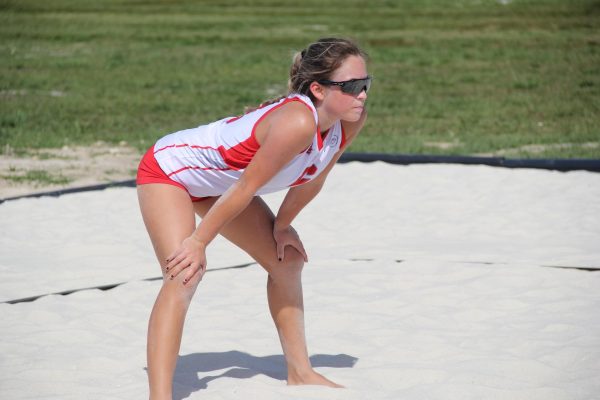 Sunglasses on, senior Audrey Noval prepares herself for the next play. 