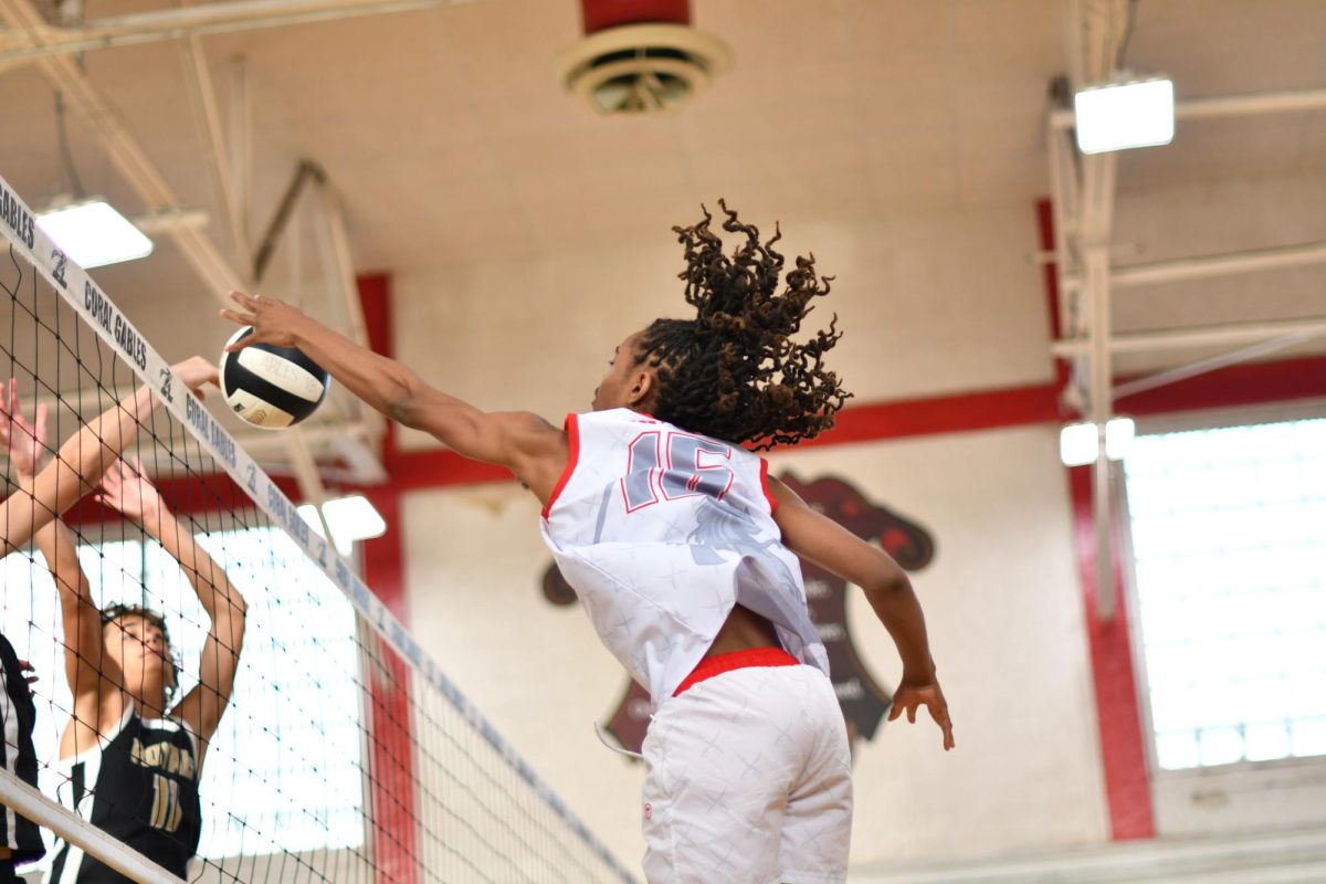 Senior Dearte Butler showed off the skills learnt throughout his years on the team, scoring a point against La Salle on senior night.