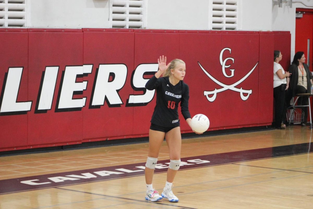 Junior Corina Mcdanal winds up to hit her impressive serve. 