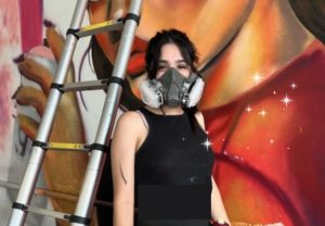 Painting has become a natural instinct for Ugarte. Grabbing spray paint and her mask, she is transported to another world, one of artistic expression. 