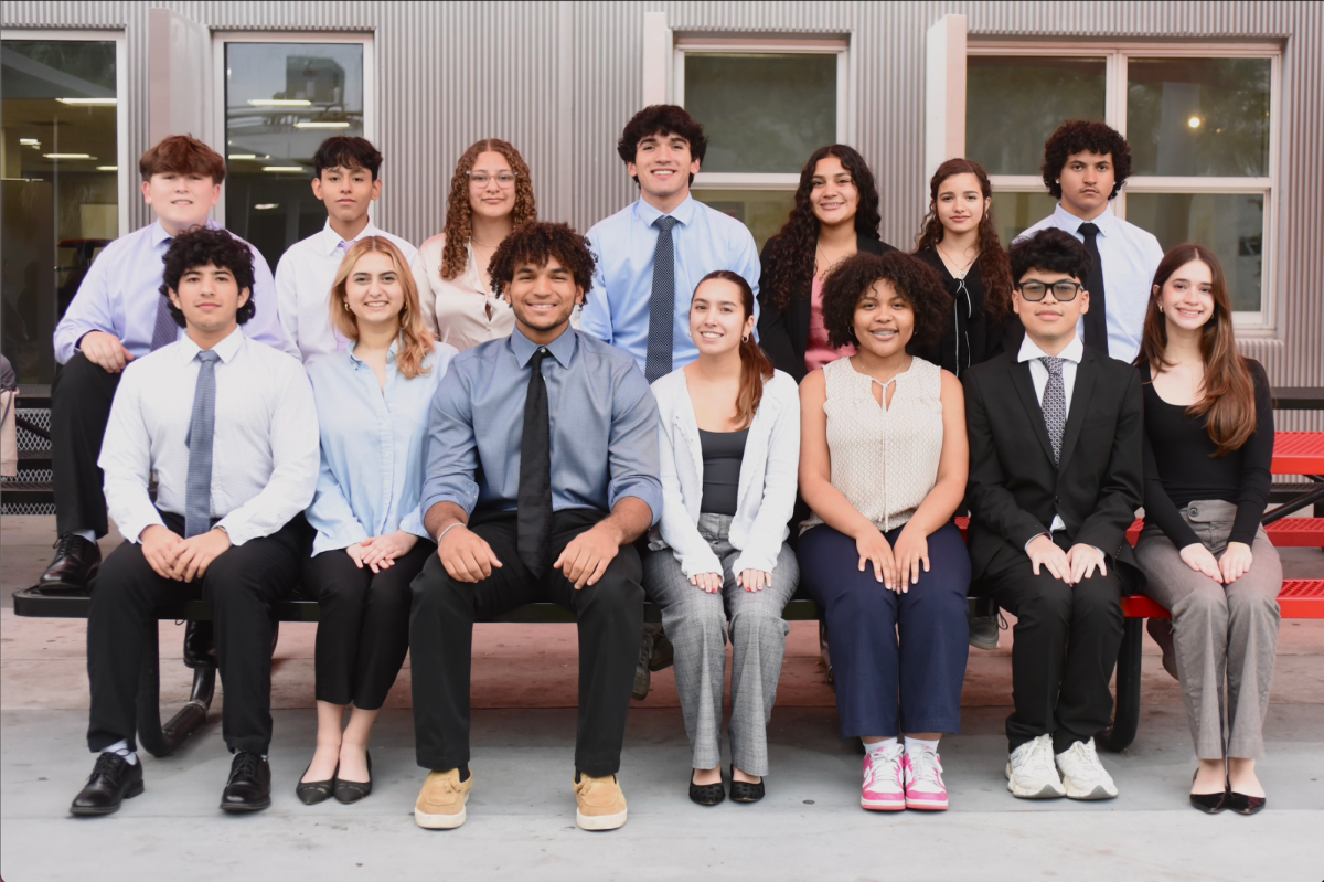 The 2024-2025 board is pictured smiling together to have a keepsake of the time they will spend this year achieving greatness.