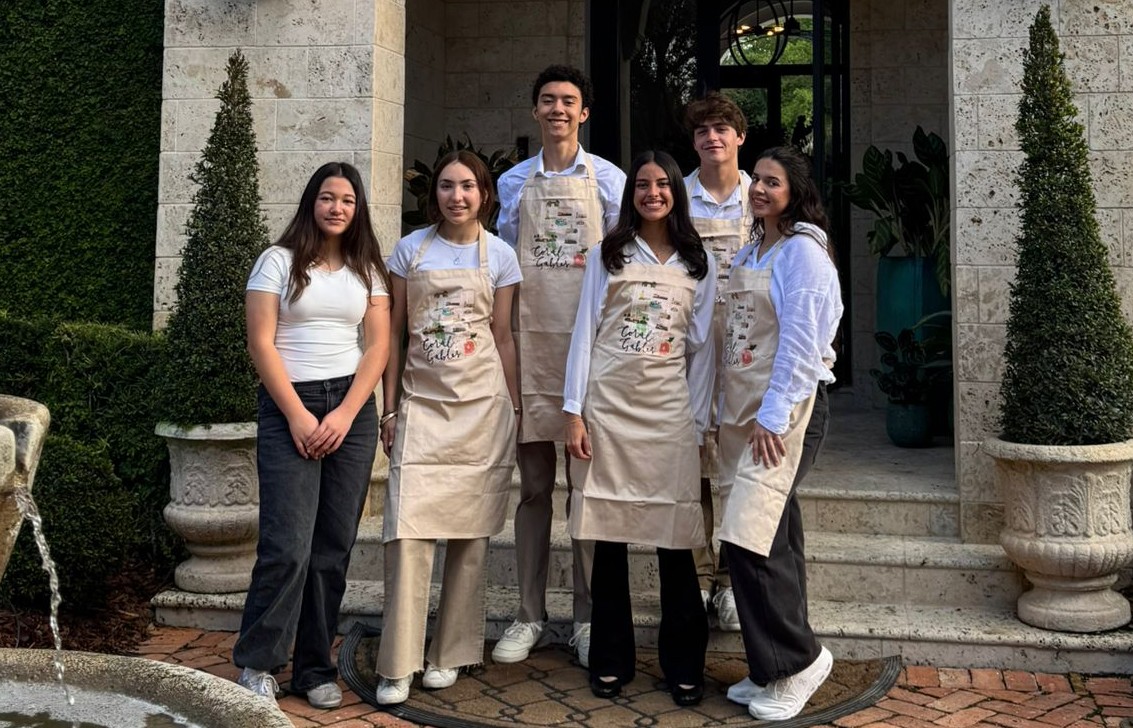 Student Activities members pose outside their respective houses eager to assist with preparations for Tour of Kitchens.