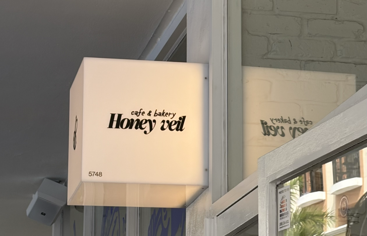 Sisters Cecilia and Regina Alcobe officially opened their first Honey Veil storefront at 5748 Sunset Drive, transitioning from a mobile trailer to a full-service café and bakery.