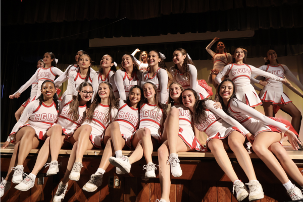 Our cheerleading team gathers at the end of the stage to execute a picture perfect pose. 