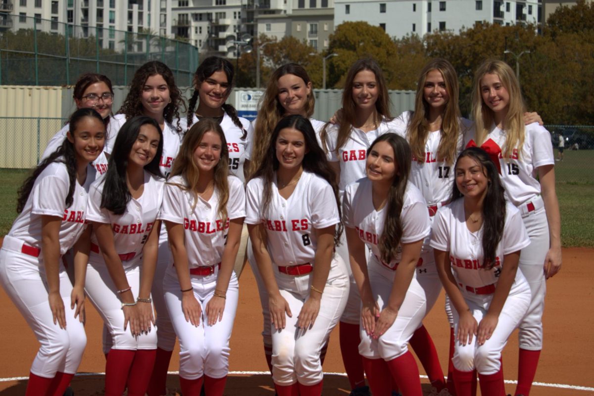The Lady Cavaliers pose for their Media Day group photo on their first game, filled with nothing but sheer pride and excitement.